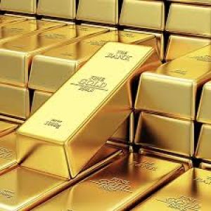 الذهب يتراجع مع تحسّن مفاوضات التجارة والدولار يحد من الخسائر